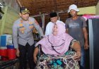 Kapolres Lhokseumawe Beri Bantuan Kursi Roda dan Sembako untuk Sabariah