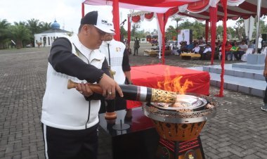 Kapolres Pimpin Upacara Kirab Api PON XXI Aceh-Sumut 2024, Disambut Meriah di Kabupaten Simalungun