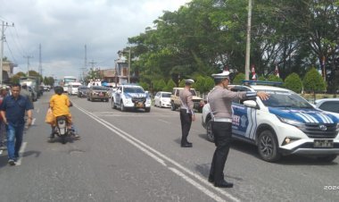 Polres Simalungun Kawal Kirab Api PON XXI Tahun 2024 Aceh-Sumut dengan Lancar dan Meriah