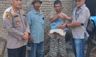 Kapolsek Perdagangan Gelar Jumat Barokah, Bagikan Sembako kepada Warga Kurang Mampu