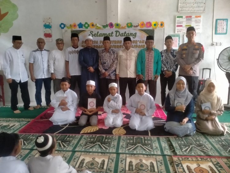 Kapolsek Tanah Jawa Hadiri Pesantren Qur'an di Madrasah Birrul Walidain, Dorong Cinta Al-Quran Sejak Dini