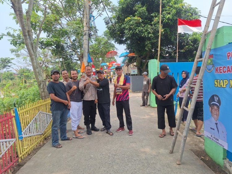 Polsek Cikupa Ikut Kerja Bakti Persiapan Pembinaan Wilayah PKK di Desa Cikupa