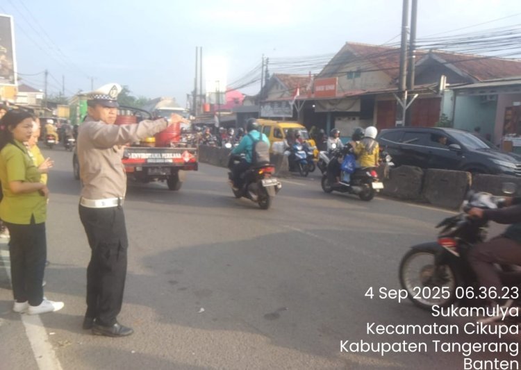 Polsek Cikupa Gelar PECAK Pagi Hari, Pastikan Kelancaran Arus Lalu Lintas di Pertigaan Columbus