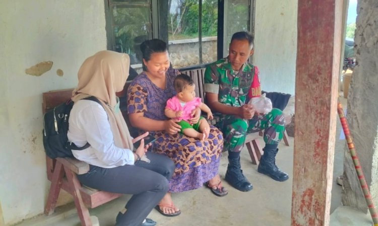 Babinsa Koramil Bulukerto Dampingi Salurkan Bantuan (GENTING)